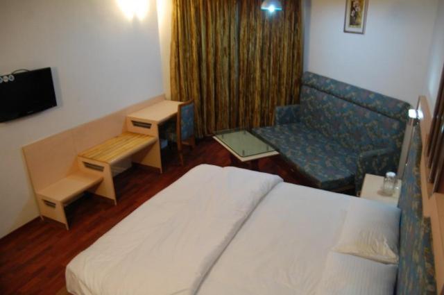 Pleasant Stay Kodai Hotel Pvt. Ltd. كوديكانال الغرفة الصورة